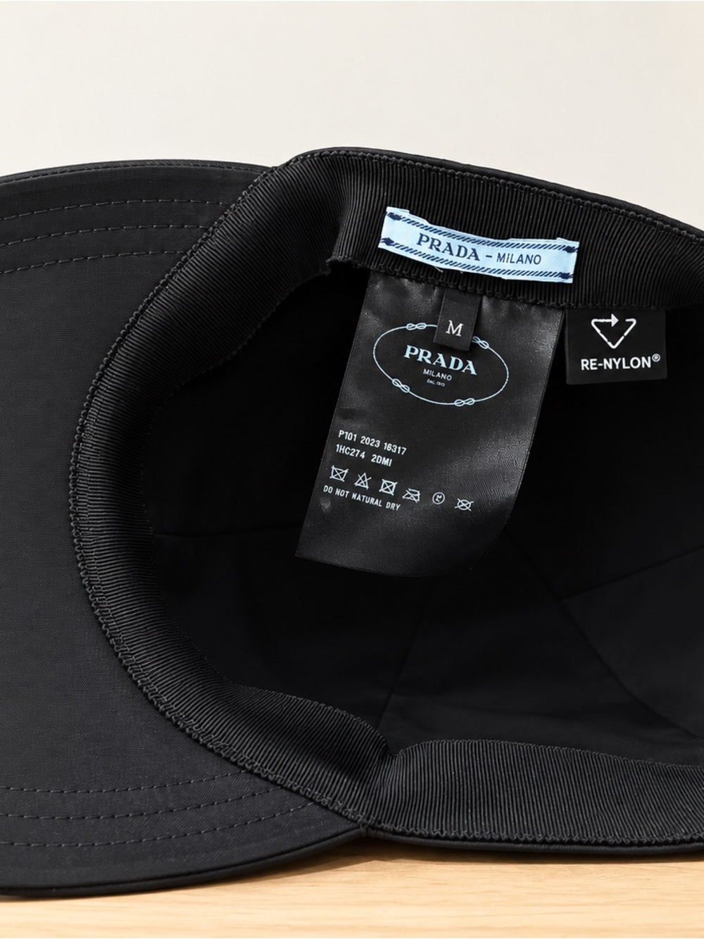 Prada Black Re-Nylon Baseball Cap with Silver Triangle Badge - Picture 2 of 5
